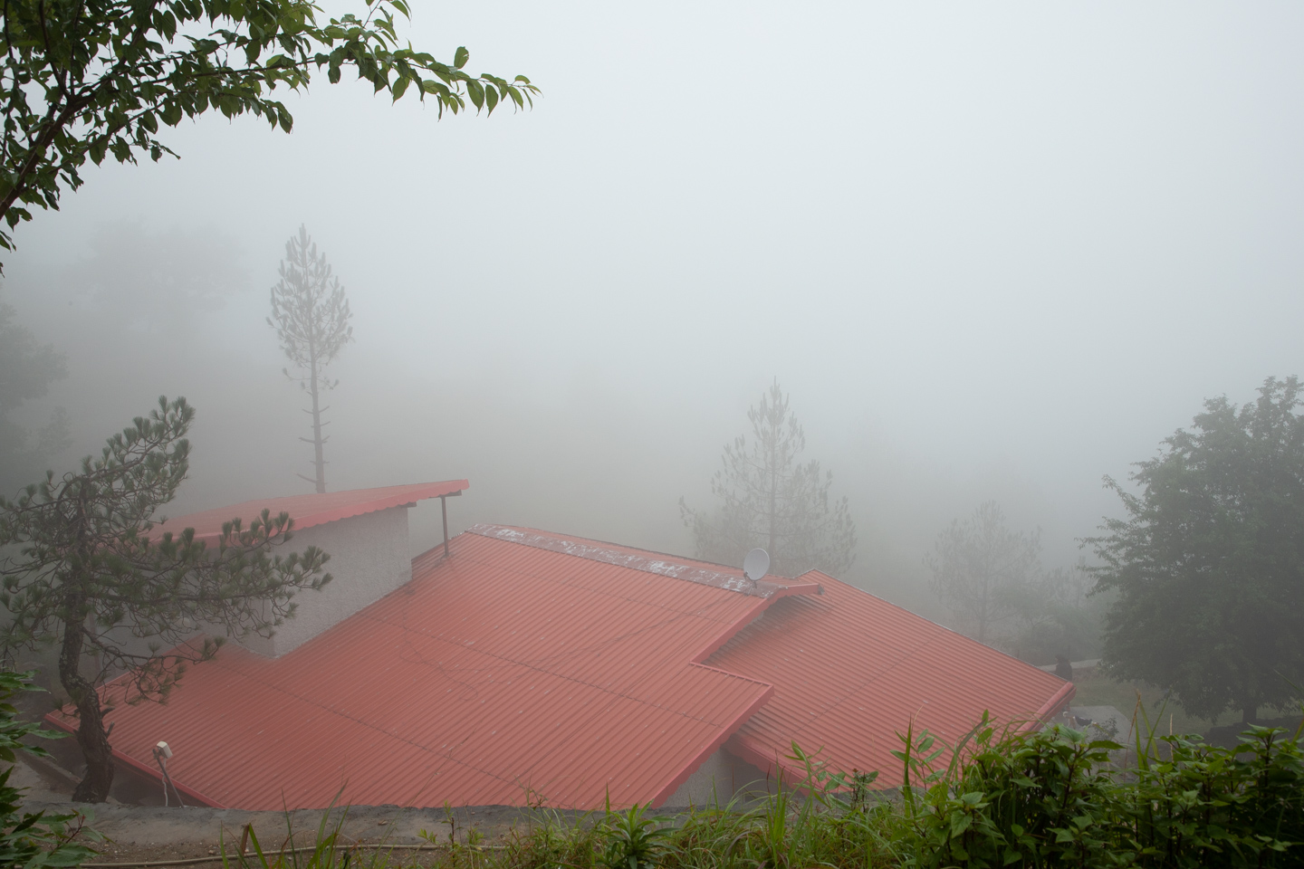 The house seen from above in the fog