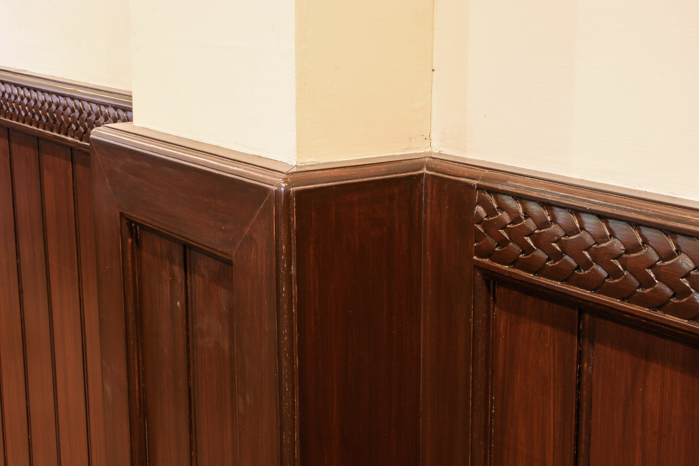 Carved wood panelling in the conference room.